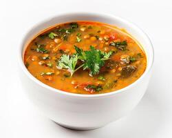 a bowl of soup with a garnish of parsley background photo
