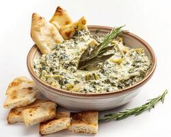 spinach and artichoke dip with crackers background photo