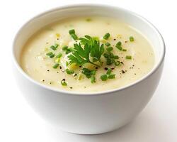 a bowl of soup with a garnish of parsley background photo