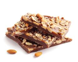 chocolate bark with almonds and nuts on a white background photo