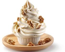 a cup of ice cream with nuts on top photo
