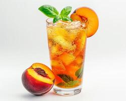 a glass of iced tea with a peach and a slice of peach background photo