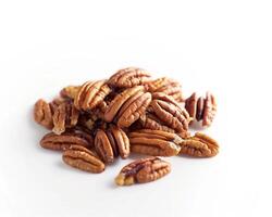 a pile of pecans on a white background background photo