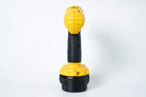Yellow and black cordless drill. photo