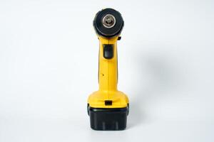 Yellow and black cordless drill. photo