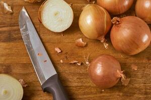 Onions on a cutting board photo