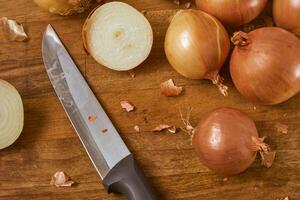Onions on a cutting board photo