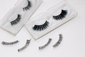 False decorative eyelashes on a white background. photo