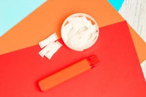 Nicotine pads snus, cigarette replacement, together with an electronic cigarette. photo