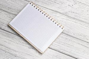 Notebook diary for planning and studying on the table. photo