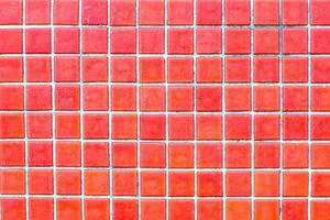 Texture of red mosaic tiles, close-up photo