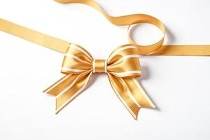 Golden bow with white stripes on white background photo