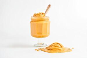 Peanut Butter Dripping Out of Glass Jar photo