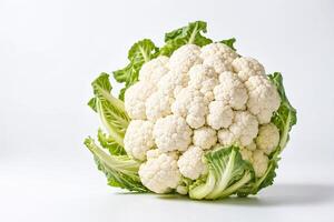 Fresh Cauliflower Head with Green Leaves on White Background photo