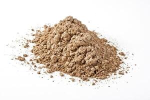 Pile of Brown Powder Isolated on White Background photo