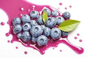 Fresh blueberries with juice spill photo