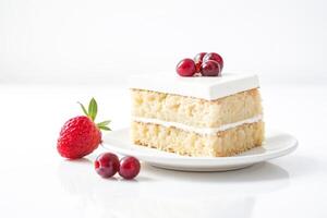 Slice of White Cake with Strawberries and Grapes on a Plate photo