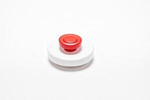 Red Button on White Base photo