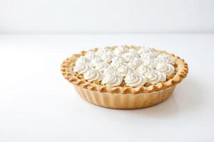Freshly baked pie with whipped cream topping photo