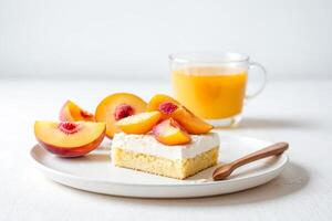 Delicious Peach Cake with Whipped Cream and Fresh Peaches photo