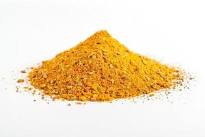 Heap of Yellow Spices on White Background photo