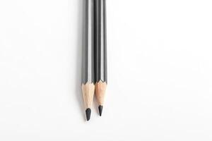 Two Graphite Pencils on White Background photo
