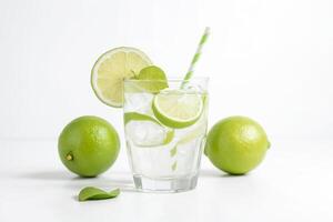 Refreshing Lime Drink with Ice and Straw photo