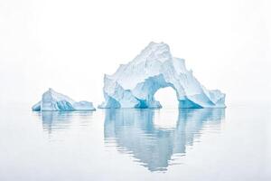 Iceberg arch in the Arctic Ocean photo
