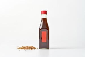 Brown Liquid in Glass Bottle with Red Cap and Seeds photo