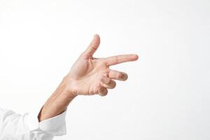Close-up of a man's hand pointing to the right, isolated on a white background photo