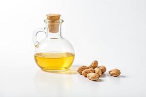 Peanut Oil and Peanuts on White Background photo