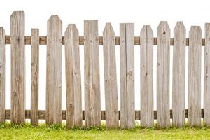 Rustic Wooden Fence with Green Grass photo