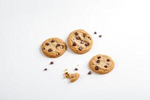 Three Chocolate Chip Cookies on White Background photo
