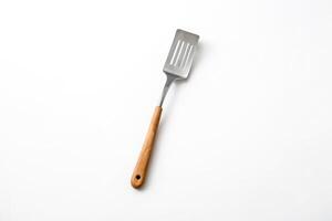 Wooden Handle Spatula on White Background photo