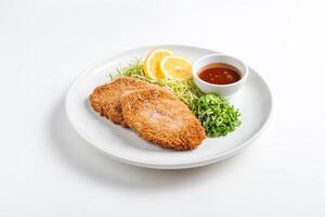 Crispy Fried Chicken Cutlets with Lemon, Green Onion and Sauce photo
