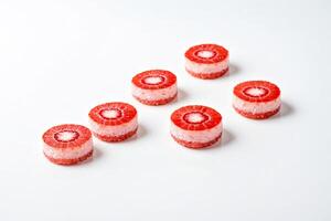 Strawberry Sushi Rolls on White Background photo
