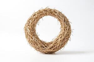 Closeup of a Natural Straw Wreath on a White Background photo