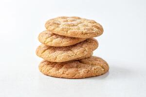 Close-up of a stack of sugar cookies on a white background photo