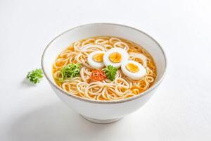 Close-up of a bowl of ramen with a soft-boiled egg photo