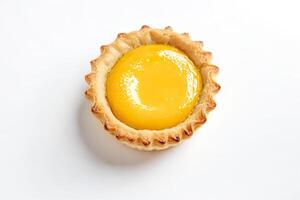Close up of a single custard tart on a white background photo