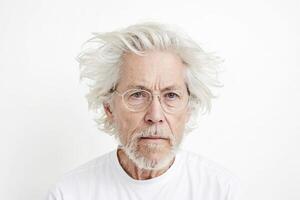 Portrait of a Serious Senior Man with Gray Hair and a Beard photo