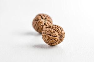 Walnuts on white background photo