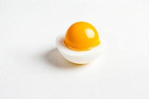Half of a boiled egg on a white background photo