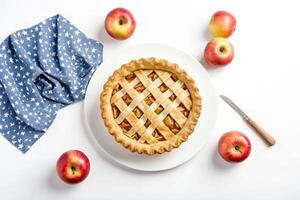 Apple Pie and Apples on a White Background photo