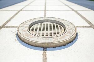 Close Up of a Drainage Grate photo