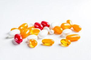 Multicolored Capsules on White Background photo