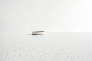 Minimalist White Bowl on a White Table photo