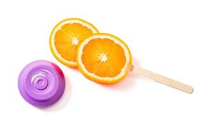 Orange Slice Popsicle on White Background photo