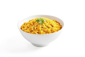 Close-up of a bowl of yellow rice with parsley photo