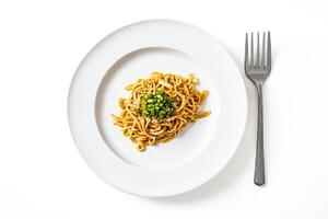 Close-up of a Plate of Noodles with Green Onions and Sesame Seeds photo